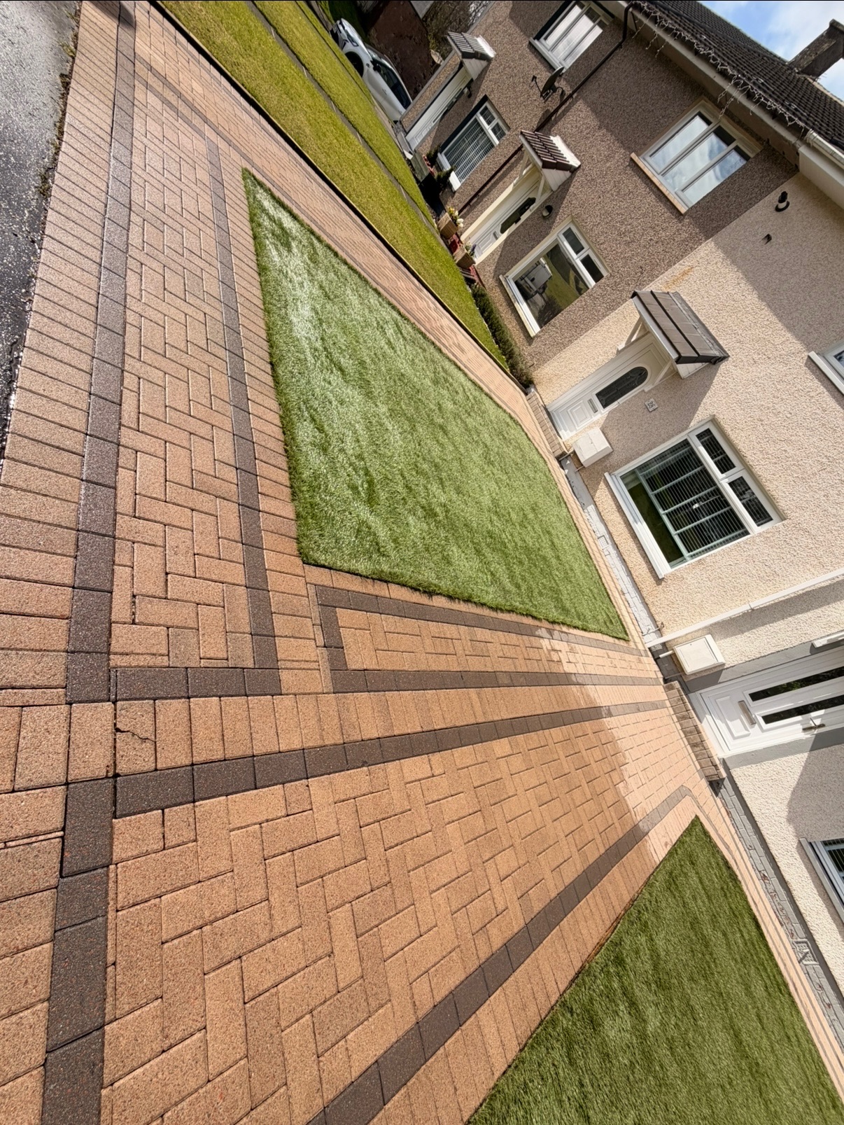Finished driveway with grass feature in Glasgow - professional power washing