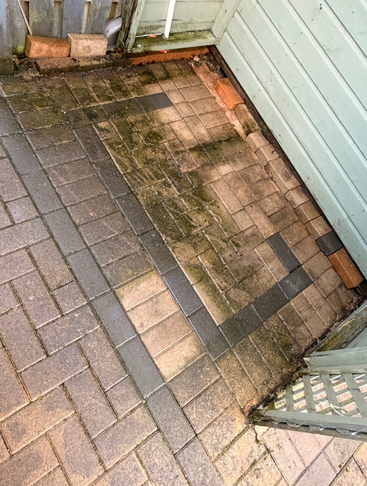 Before block paving cleaning in Motherwell - moss and grime